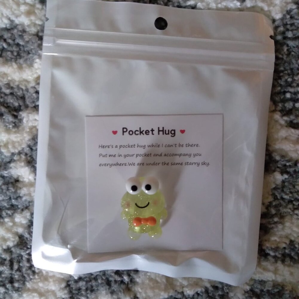 New resin frog with bow tie pocket hug. Novelty gift
